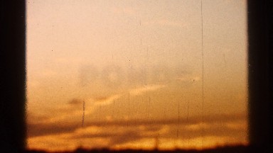 1966: magic hour of the sun setting at dusk with the sky lit orange FLORIDA