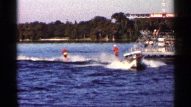 1966: four water skiers performing ski show for onlookers FLORIDA