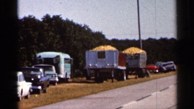 1966: the vehicles are stand inside of the road one by one. FLORIDA