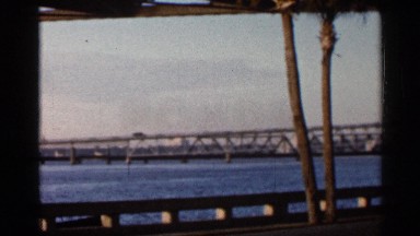 1966: two bridges are built on the river many cars and vehicle and cross