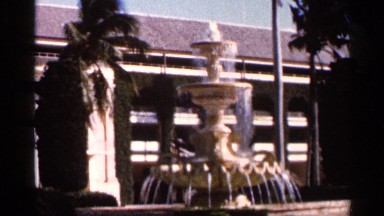 1966: ornate outdoor fountain has water flowing from different tiers FLORIDA