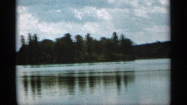 1965: wooded island on a cloudy day DULUTH MINNESOTA