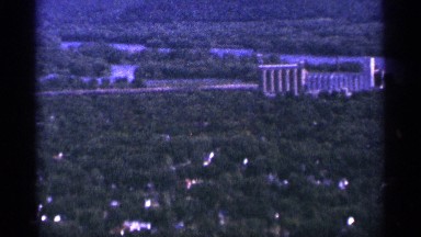1965: a long shot took many trees and building showed its look like a city
