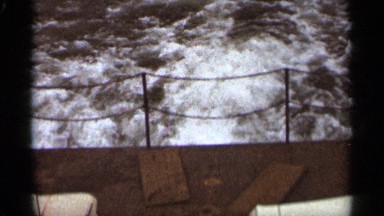 1965: beautiful view of river over the bridge made up of iron and concrete