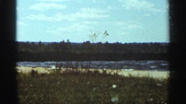 1965: rivers are floating a place which are all surrounded by trees DULUTH