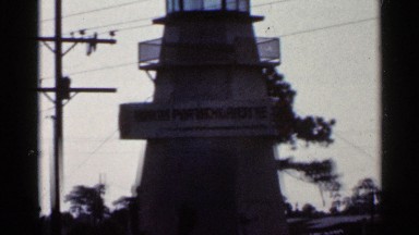 1966: a huge of water is shown it is a river pond are sea and last the building