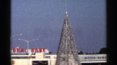1966: Glistening Silver Christmas Tree by the National Motor Bank