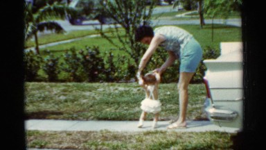 1963: a cute moments with baby in an park. MISSISSIPPI