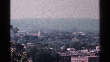 1964: many trees and some buildings are showed its very natural and fully green