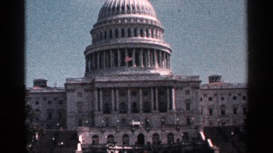 1964: the front of the united states capitol building on a sunny day. WASHINGTON