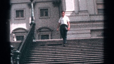 1964: one man walk slow on the steps near the building morning time WASHINGTON