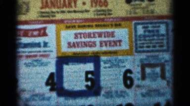 1965: numbers and post that looks like an event advertisement located at a wall