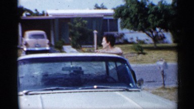 1958: one lady clean for our car near to house tree,green grasses