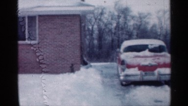 1958: a house at the snow time there is full covered snow and white ice
