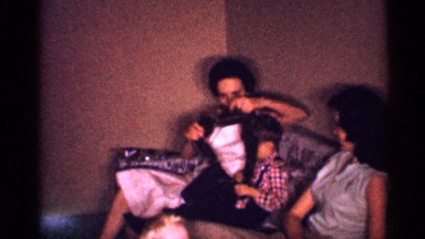 1958: a baby gets scarfed by his mother, other runs to his father. NEW JERSEY