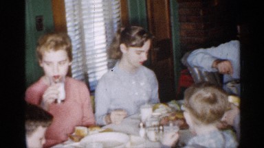 1958: eating at home around dining table where all peoples are eating NEW JERSEY