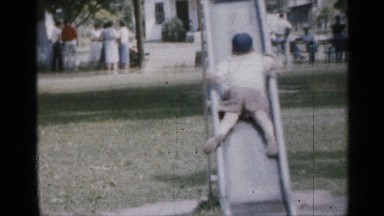 1958: the children play in a park high to come to low bench near tree building