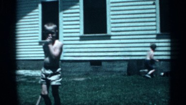 1958: boys playing cricket one remains zipping his finger without hitting