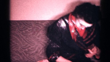 1958: baby put powder in the lady eyes smoking and laying in sofa NEW JERSEY