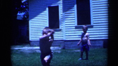 1958: a small boy play in cricket our house back side ground bad ball near to