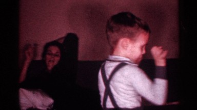 1958: the small boy walk the home near our mother sit in the furniture back side