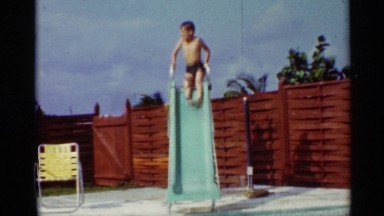 1963: The Boy Playing in the Swimming Pool with Huge Enjoyment