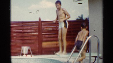 1963: the boy swimming pool the swimming very fast near the wall and steps steel