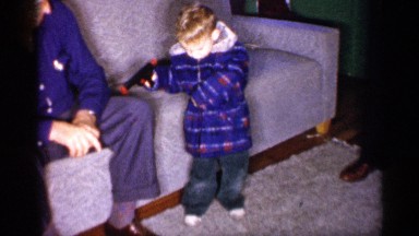 1959: the boy playing in him home with using water gun MICHIGAN