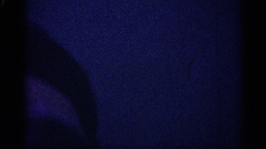 1959: a man face available only little in the place and the sky background