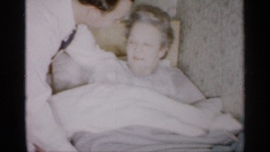 1959: a old sick women kiss for the our family morning time sleep the any time