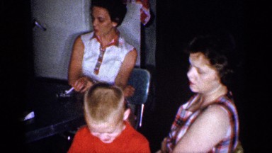 1959: child sits with mother MICHIGAN
