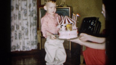 1959: a child with his mother holding a cake MICHIGAN