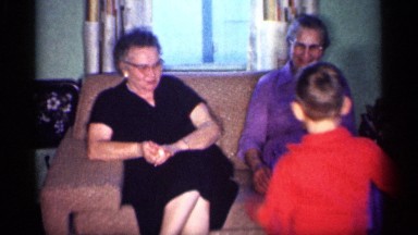1959: kid playing with her parents MICHIGAN