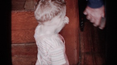 1955: in the video the baby looking very sad, vintage clip