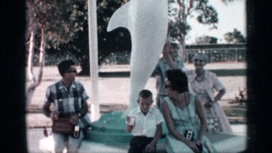 1958: family enjoys a relaxing time at a water theme park