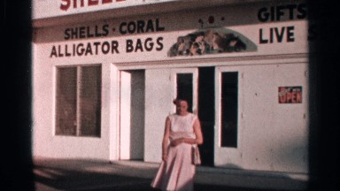 1958: a girl is standing near the shop FLORIDA