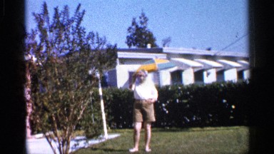 1958: the old women still the photo hand, vintage clip