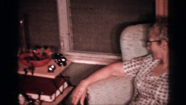 1958: camera pans over the whole family as child runs through FLORIDA