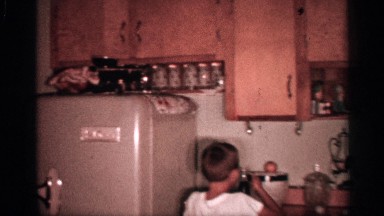 1958: the small children check the kitchen, vintage clip