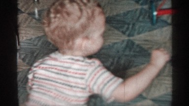 1955: A Baby Plays on the Floor in a New York Dining Room