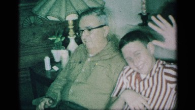 1959: the old man and the boy are shown in the video file, vintage clip