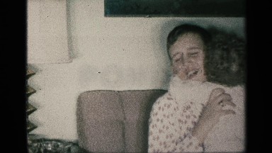 1959: the boy play with the child and he hug kiss the baby he spread his love