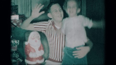 1959: a boy play in the child shaking the hand another person near to doll