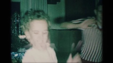 1959: young kid cannot contain christmas excitement and must dance NEW YORK
