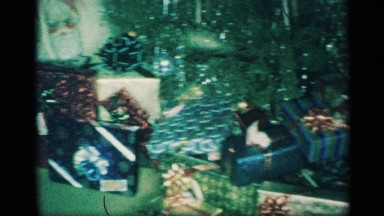 1959: more gifts are at a house and a christmas toy also available a grandson