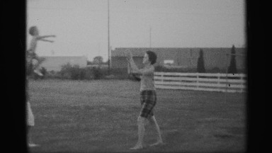 1959: the beautiful child playing with their mother and father NEW YORK