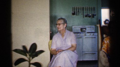 1959: two women sitting in front of a stove INDIANA