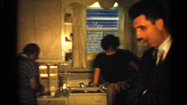 1959: a family surrounded in the kitchen. INDIANA