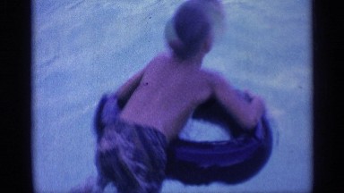 1959: the boy enjoy to swim and too much dive in the swimming pool