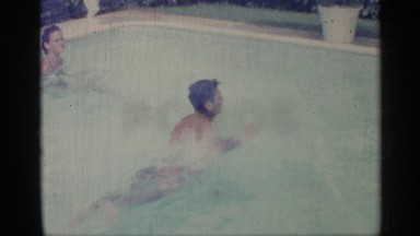 1959: going for a splash! family fun time in the backyard pool. INDIANA